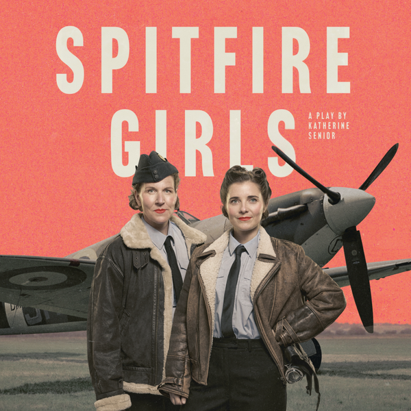Two women dressed as World War Two Era Pilots stood in front of a Spitfire Plane against an orange background. Text: Spitfire Girls