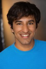 A headshot of East is East cast Rahul Sidhu. He has short hair and wears a bright blue t-shirt.