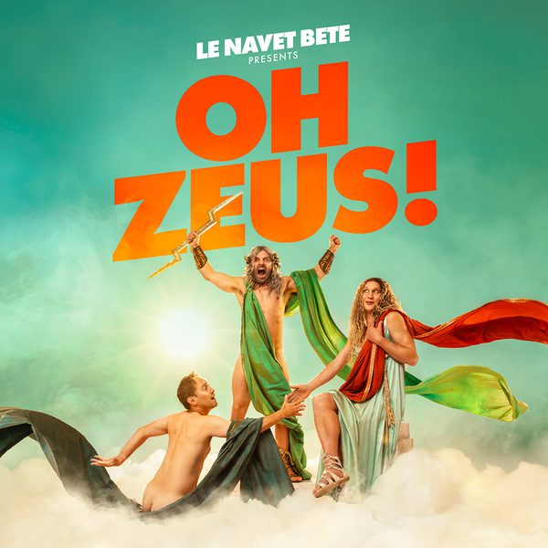 A bright turquoise cloudy sky. Large orange text in the centre reads “OH ZEUS!” Above it, smaller white text reads “LE NAVET BETE PRESENTS.” Three Greek mythology inspired figures are on a cloud. One stands on a pedestal holding a lightning bolt, one is wearing a pale robe with red and green scarves to the right, while the third is positioned lower left, partially covered by dark fabric.
