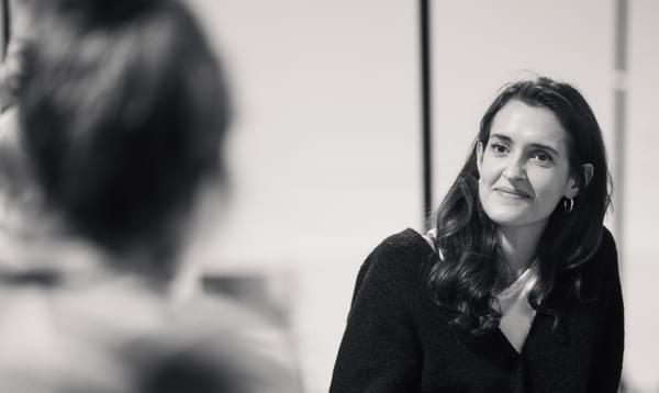 Phoebe Pryce looks at actor Joanna during scene